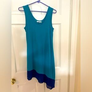 Calvin Klein asymmetrical dress. Teal blue & royal blue chiffon trim hem. Size S